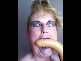 GRANNY SUCKS A SAUSAGE